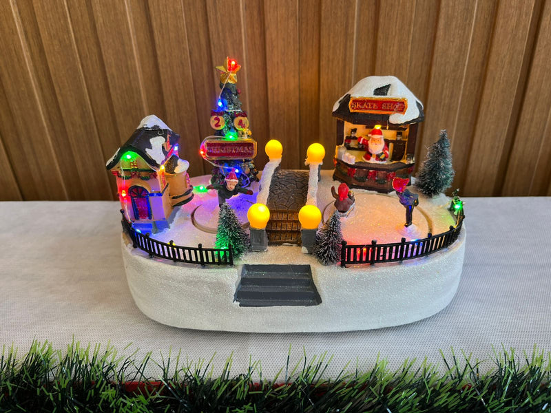 Vila de Natal patins no gelo e ponte 24x14x2cm c/Led colorido
